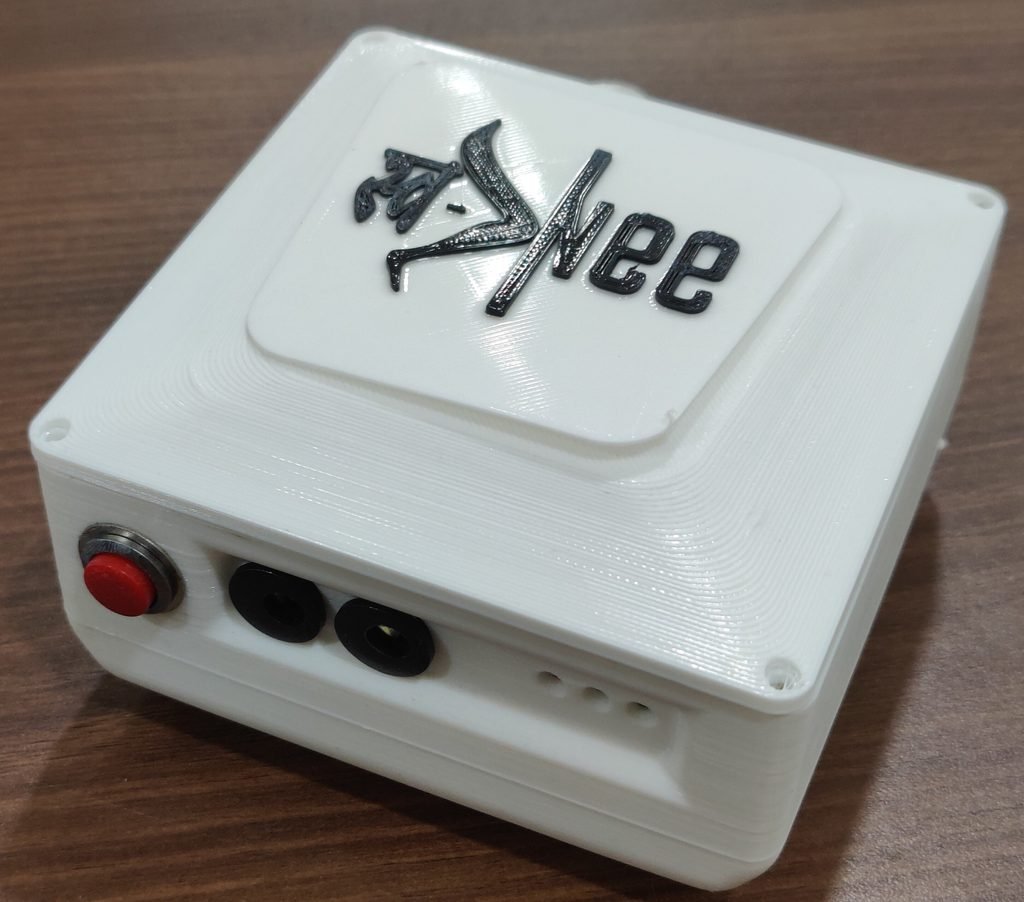 Compact SwaKnee PEMF generator module with the Swa-Knee logo